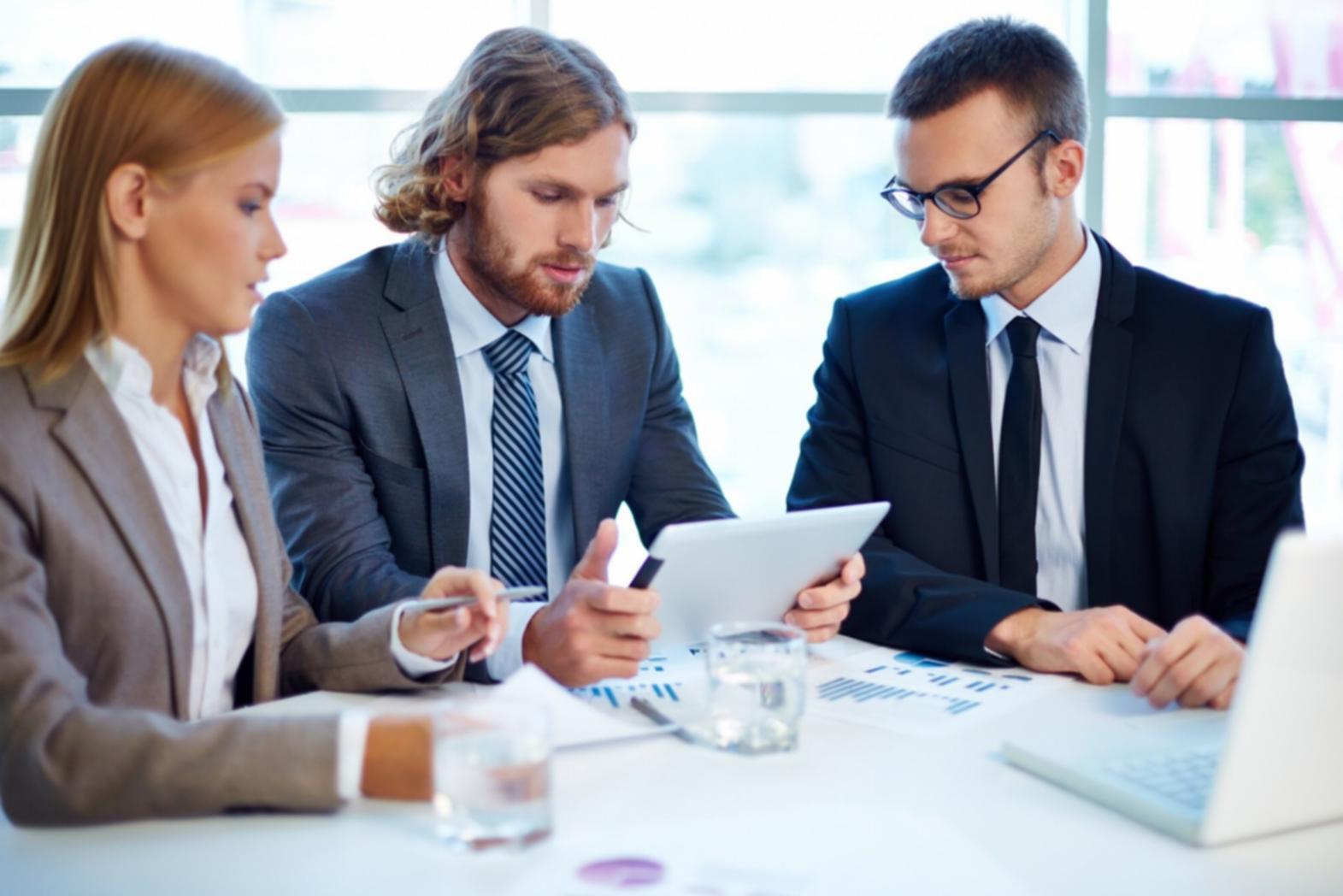 Business planning session with financial forecasting and strategic discussions